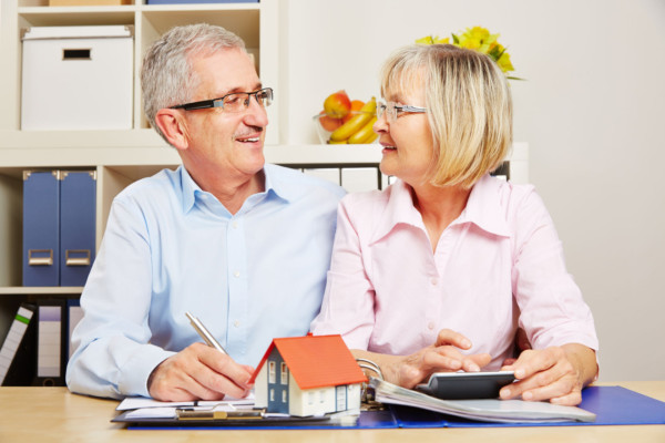 Husband and wife discussing a living trust or revocable trust